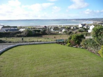 Above Beach Cottages